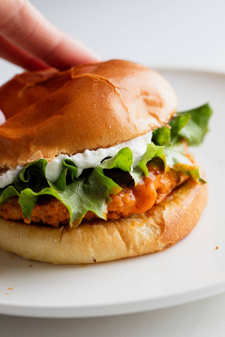 Buffalo chicken burger topped with whipped feta.