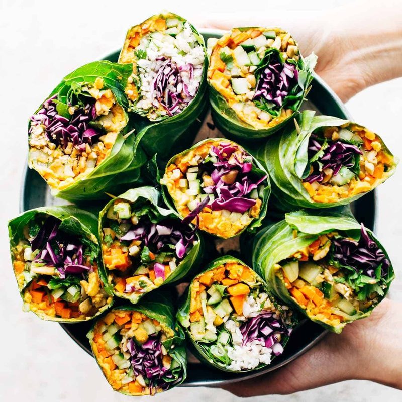 Rainbow rolls arranged on a platter.
