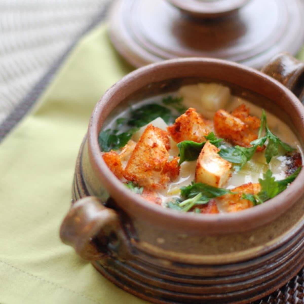 Smoky paprika croutons on soup in a bowl.