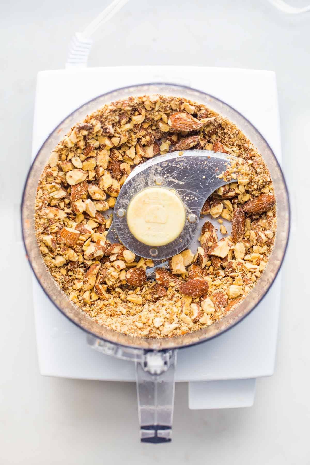 Chopped nuts in a food processor.